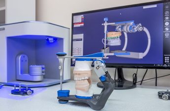 Orthodontic 3D printer and tooth model with a digital computer model.